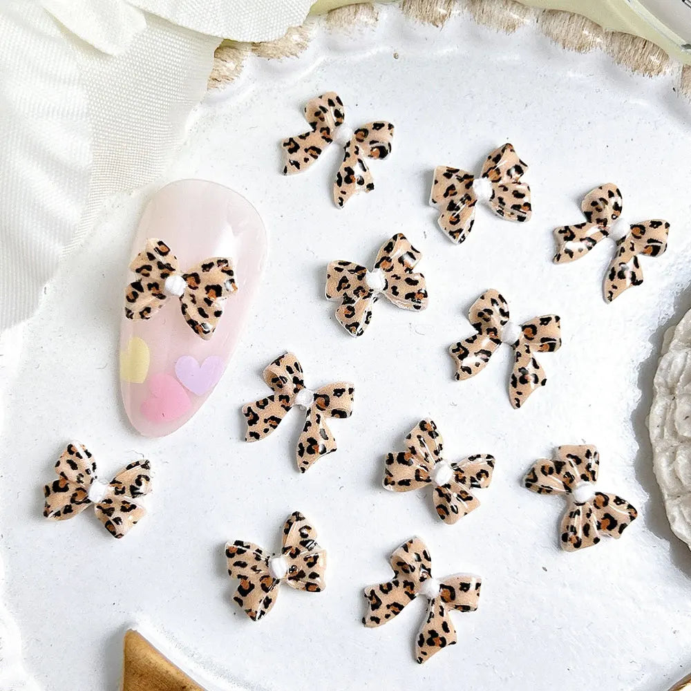 50pcs Leopard Print Bow Nail Charms