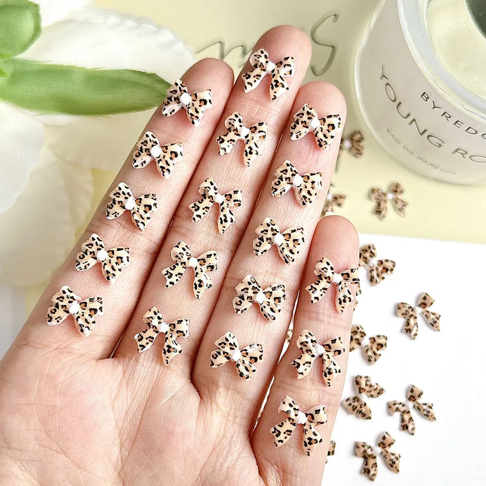 50pcs Leopard Print Bow Nail Charms
